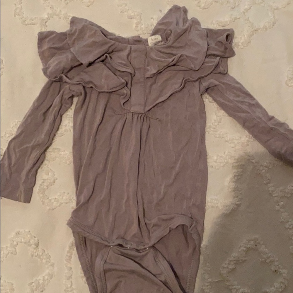 Kate Quinn purple one piece